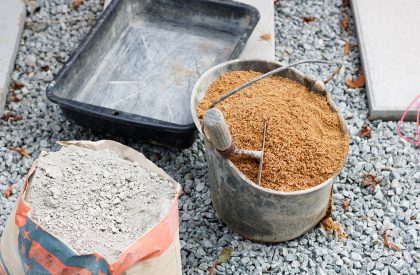 high-angle-shot-of-cement-and-sand-in-buckets-2025-02-02-11-53-06-utc